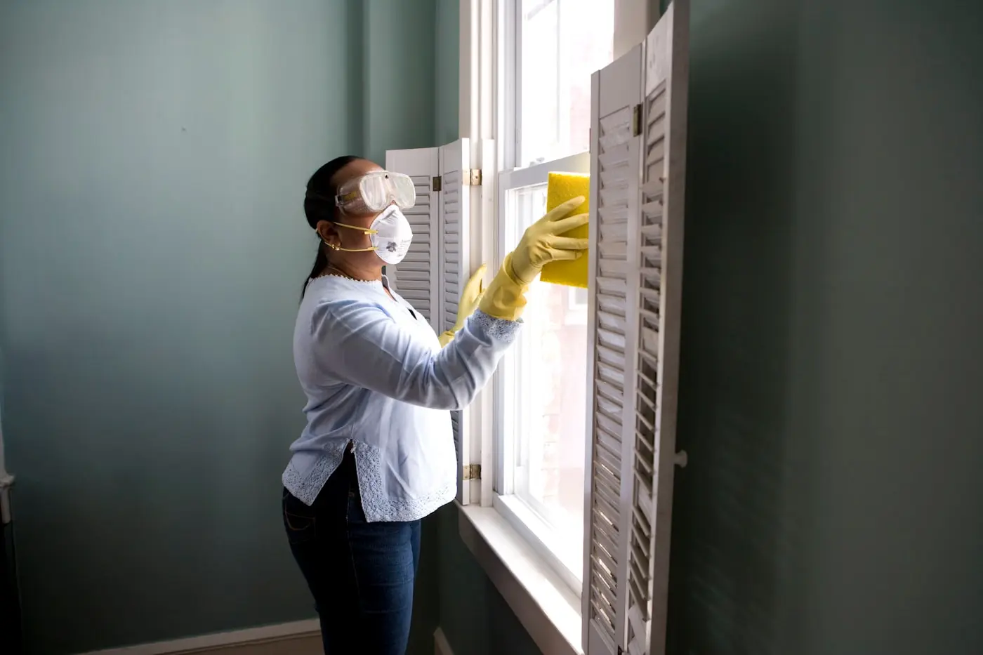 A local cleaning professional preparing a home